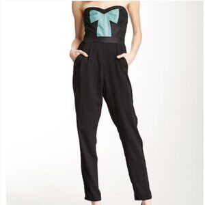 6 SHORE ROAD BLACK JUMPSUIT WITH SEQUIN BOW MEDIUM